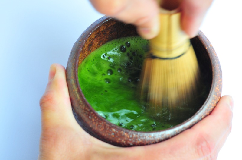 The preparation of matcha tea.